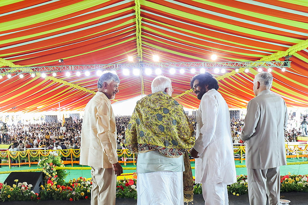 Narendra Modi with N Chandrababu Naidu and Pawan Kalyan - PTI